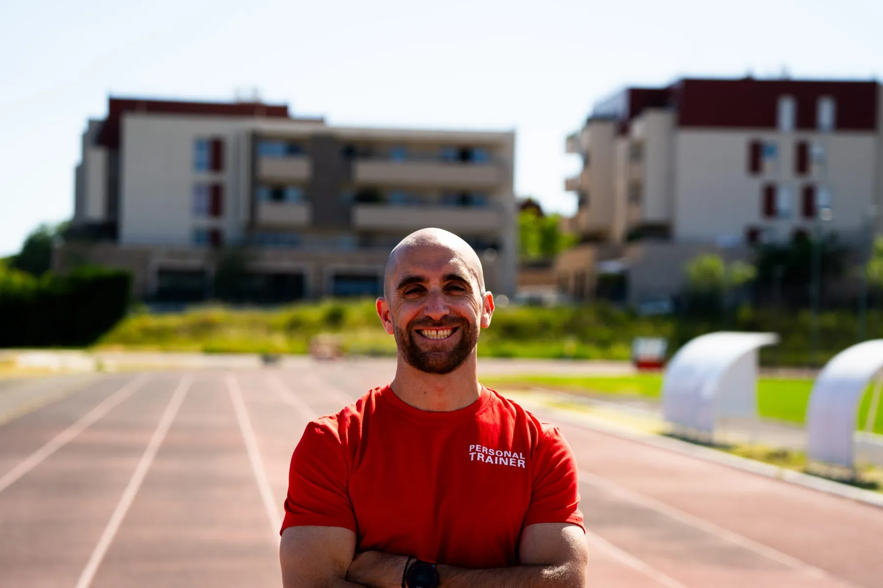 Portrait of William Boirat on an athletics track