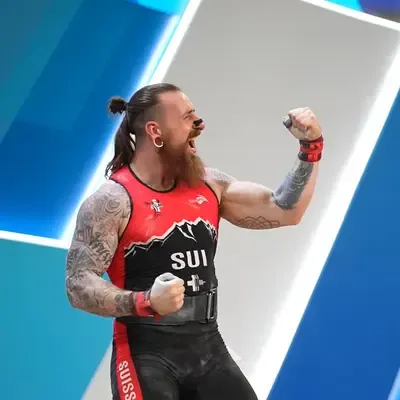 Yannick Tschan celebrating a lift for Switzerland